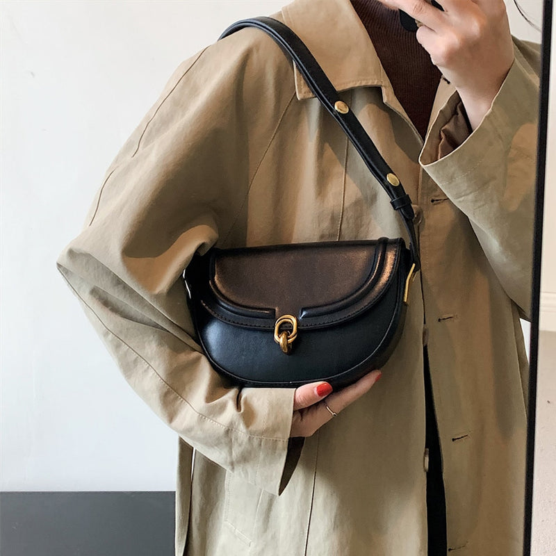 Bolsa TransversaL Saddle em couro PU