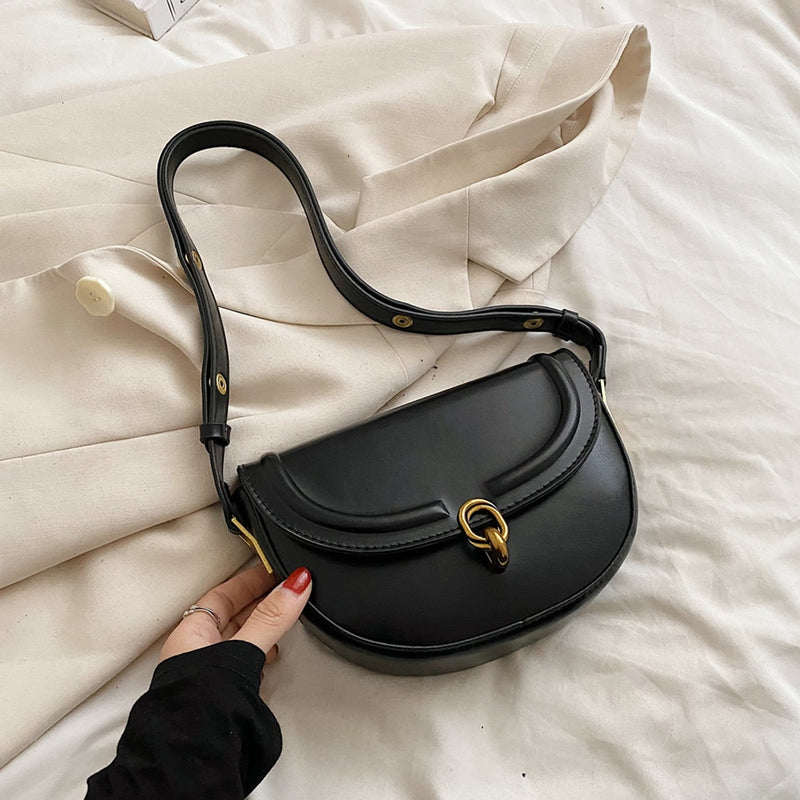 Bolsa TransversaL Saddle em couro PU
