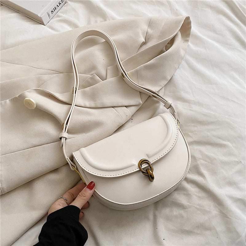 Bolsa TransversaL Saddle em couro PU