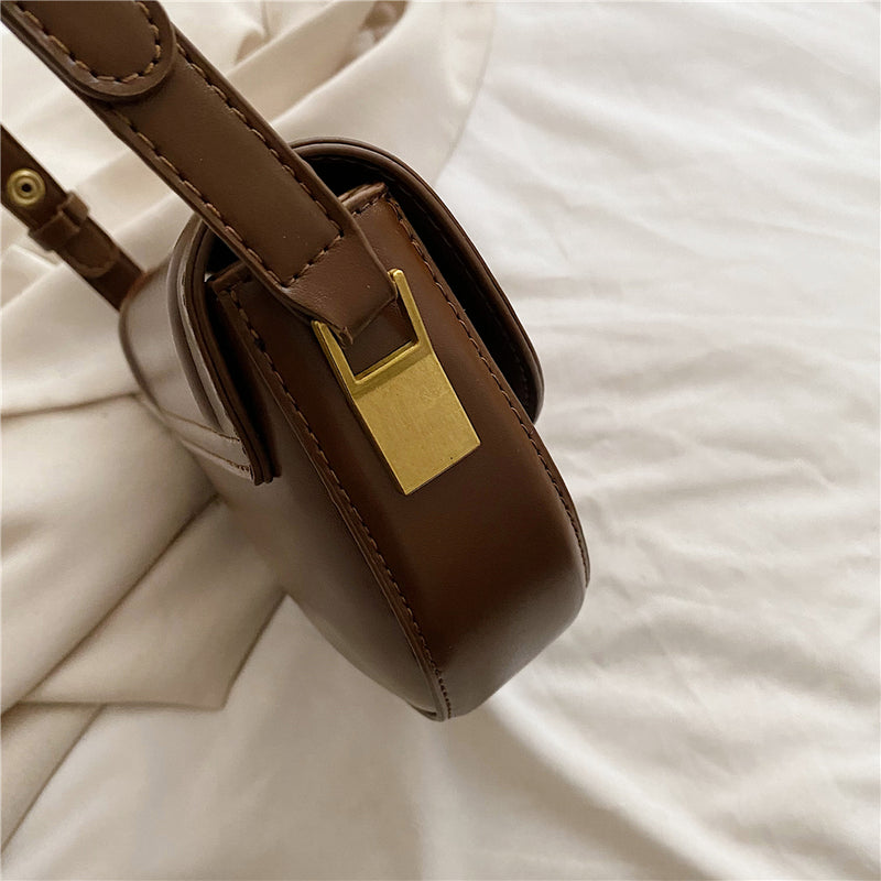 Bolsa TransversaL Saddle em couro PU