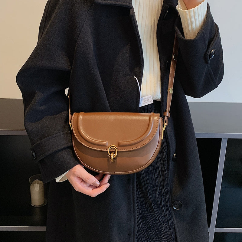 Bolsa TransversaL Saddle em couro PU