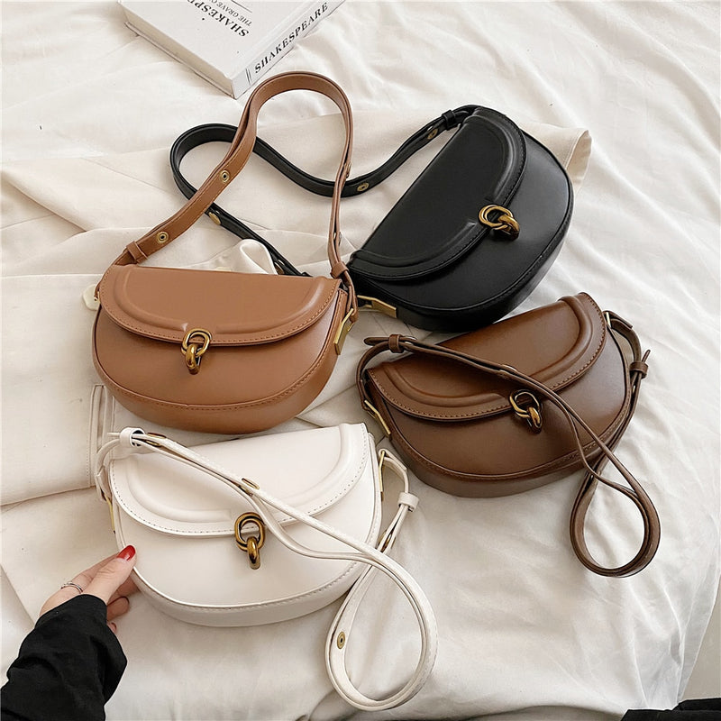 Bolsa TransversaL Saddle em couro PU