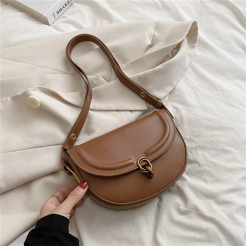 Bolsa TransversaL Saddle em couro PU